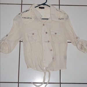 Top, cream, embroidered on the top